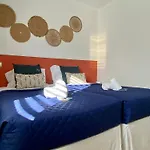 By Coral Apartment *